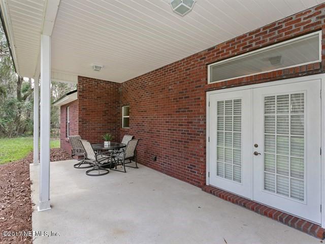 4445 Mandarin Ridge Court Jacksonville, FL 32258 - Photo 27 of 33 a view of outdoor space with porch and patio