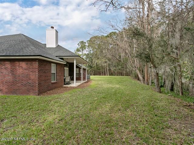 4445 Mandarin Ridge Court Jacksonville, FL 32258 - Photo 28 of 33 a house view with garden space