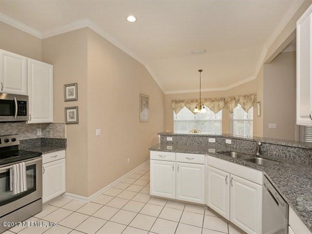 4445 Mandarin Ridge Court Jacksonville, FL 32258 - Photo 6 of 33 a bathroom with a sink a vanity and mirror
