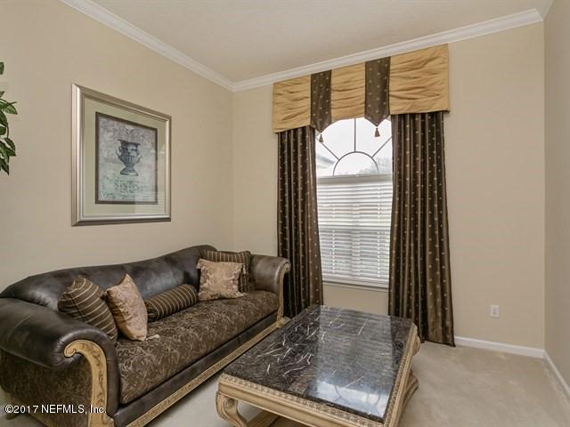 4445 Mandarin Ridge Court Jacksonville, FL 32258 - Photo 9 of 33 a living room with furniture