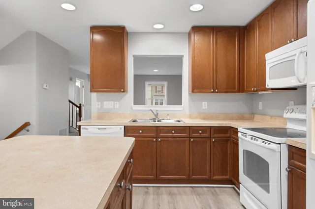a kitchen with a sink and cabinets