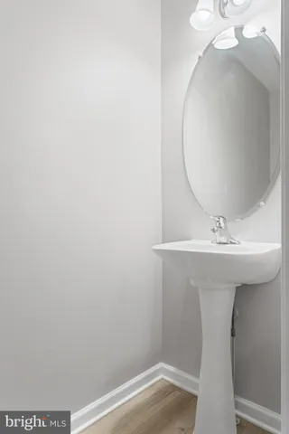 a bathroom with a sink and vanity