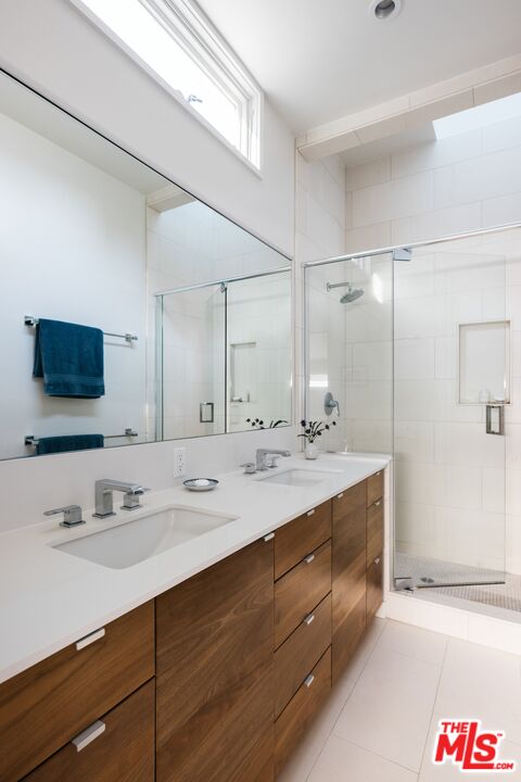 31 Silver Spring Drive Rolling Hills Estates, CA 90274 - Photo 35 of 46 a bathroom with a sink double vanity and a mirror