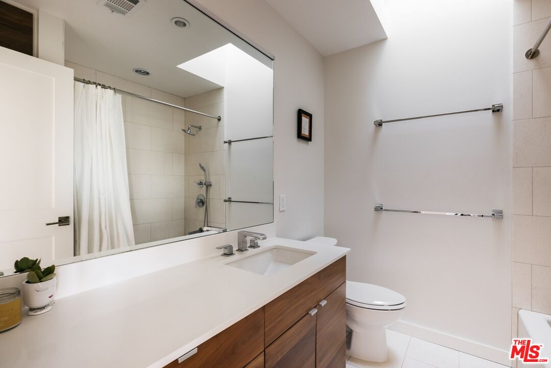 31 Silver Spring Drive Rolling Hills Estates, CA 90274 - Photo 38 of 46 a bathroom with a sink toilet and shower