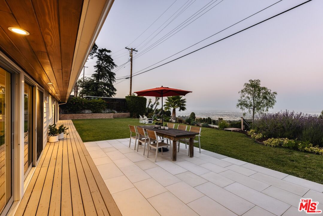 31 Silver Spring Drive Rolling Hills Estates, CA 90274 - Photo 39 of 46 a view of a patio with a table and chairs