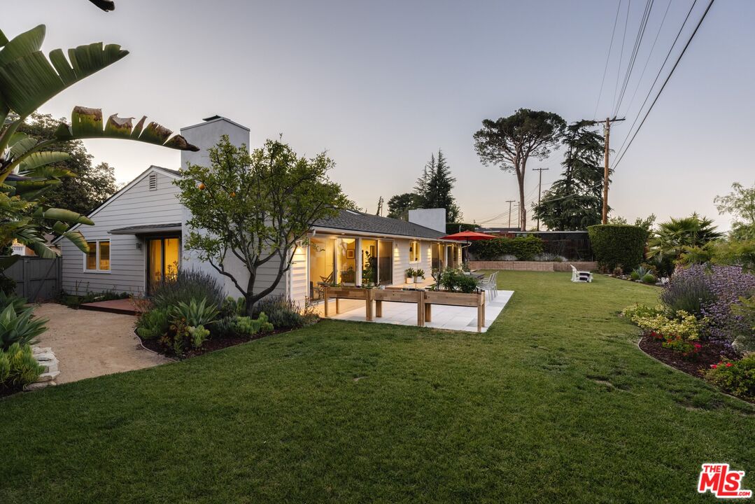 31 Silver Spring Drive Rolling Hills Estates, CA 90274 - Photo 42 of 46 a view of a house with backyard and garden