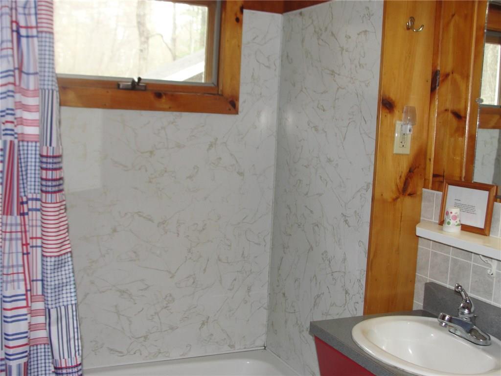 128 Highland Road Bridgton, ME 04009 - Photo 17 of 25 The shower has a window inside for...