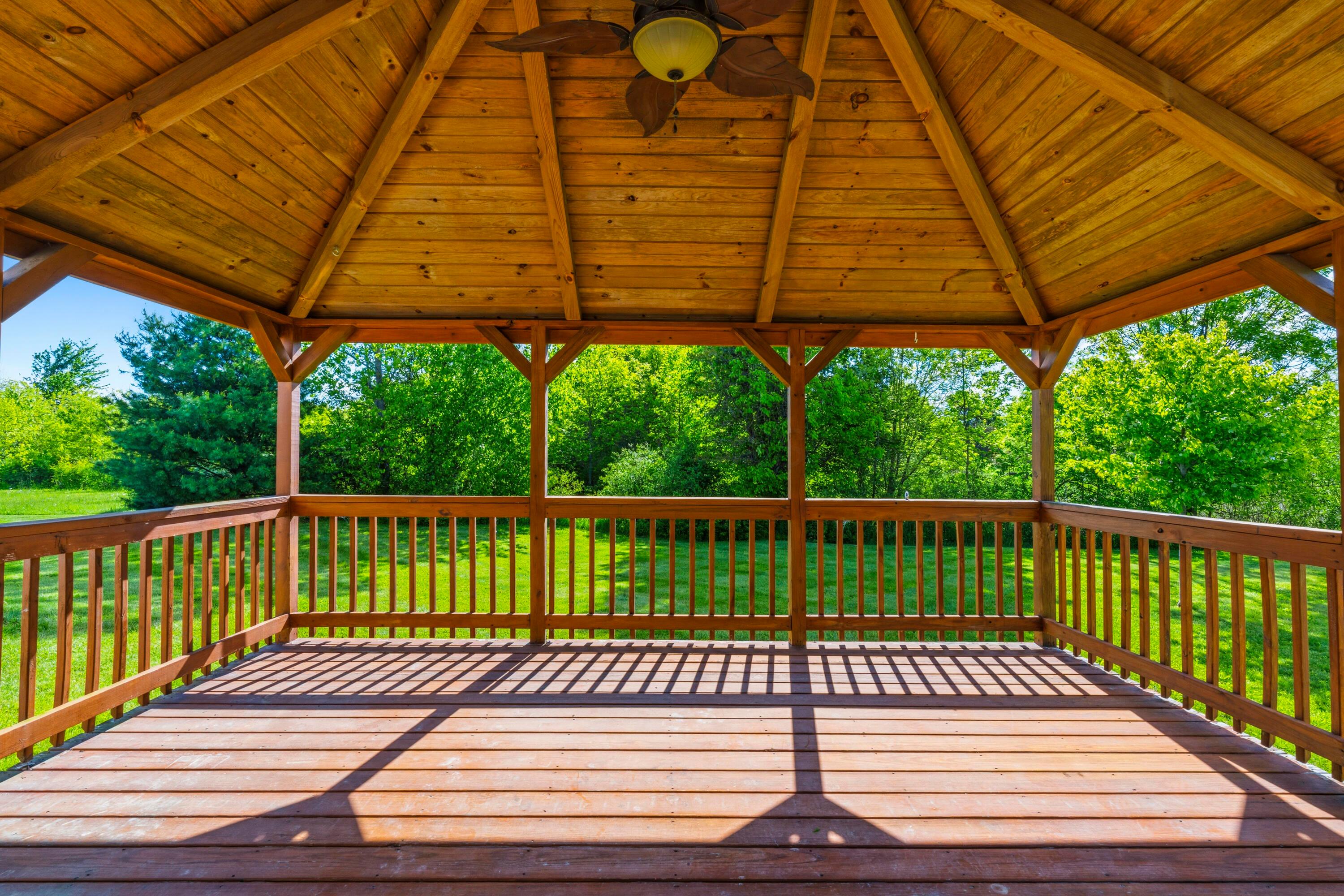 8507 Benner Road Johnstown, OH 43031 - Photo 49 of 69 NEW Deck in Fall of 2025 with metal roof gazebo, overlooking the acreage and pond!