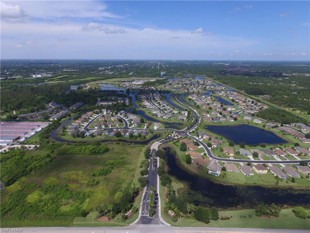 8137 Gopher Tortoise Trail Lehigh Acres, FL 33972 - Photo 14 of 21 aerial view of a city