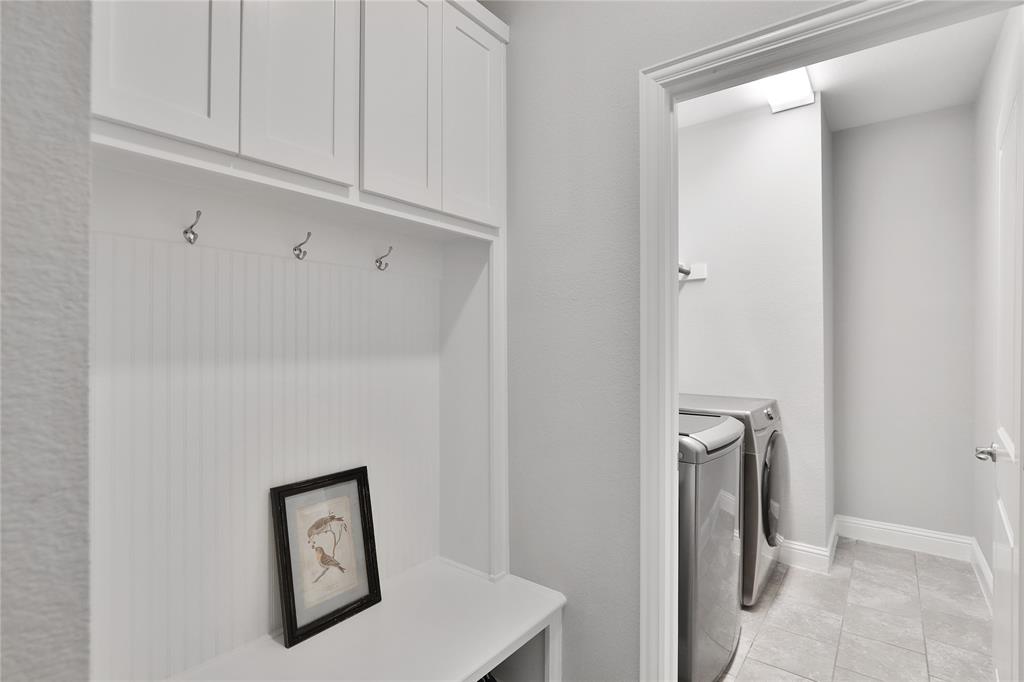 925 Spring Falls Drive McKinney, TX 75071 - Photo 19 of 40 a view of a hallway with closet
