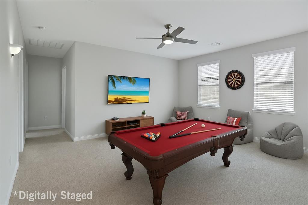 925 Spring Falls Drive McKinney, TX 75071 - Photo 23 of 40 a room with furniture and window