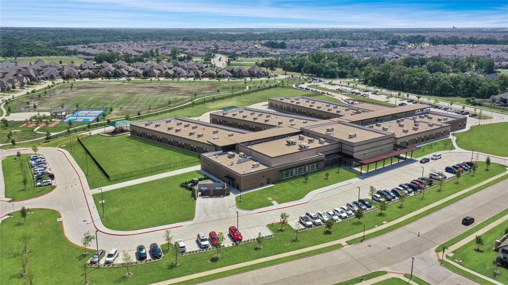 925 Spring Falls Drive McKinney, TX 75071 - Photo 36 of 40 an aerial view of a city