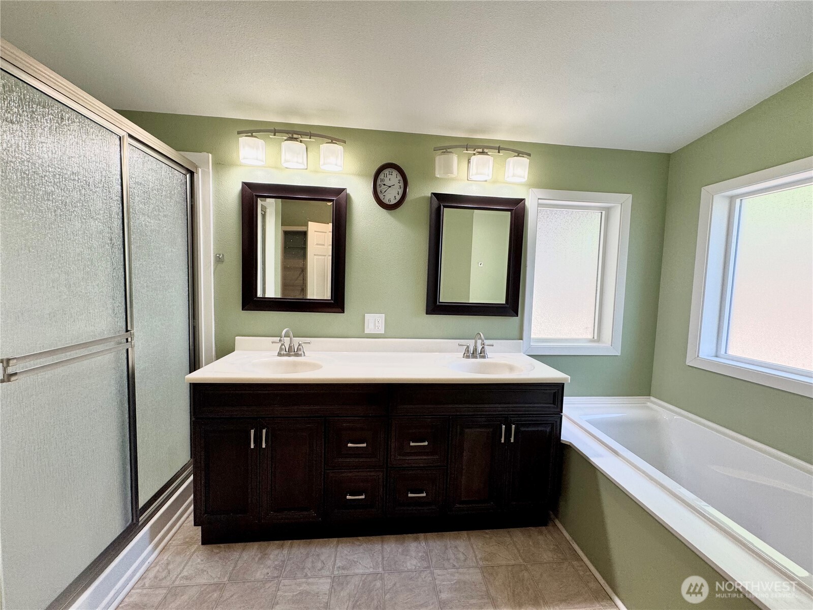 1218 South 3rd Street Dayton, WA 99328 - Photo 16 of 23 a bathroom with a double vanity sink and a mirror