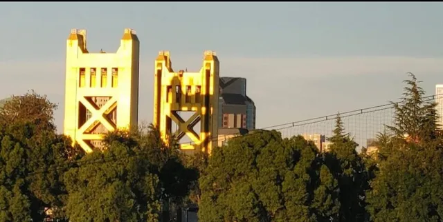 a bedroom with a large bed and a couch