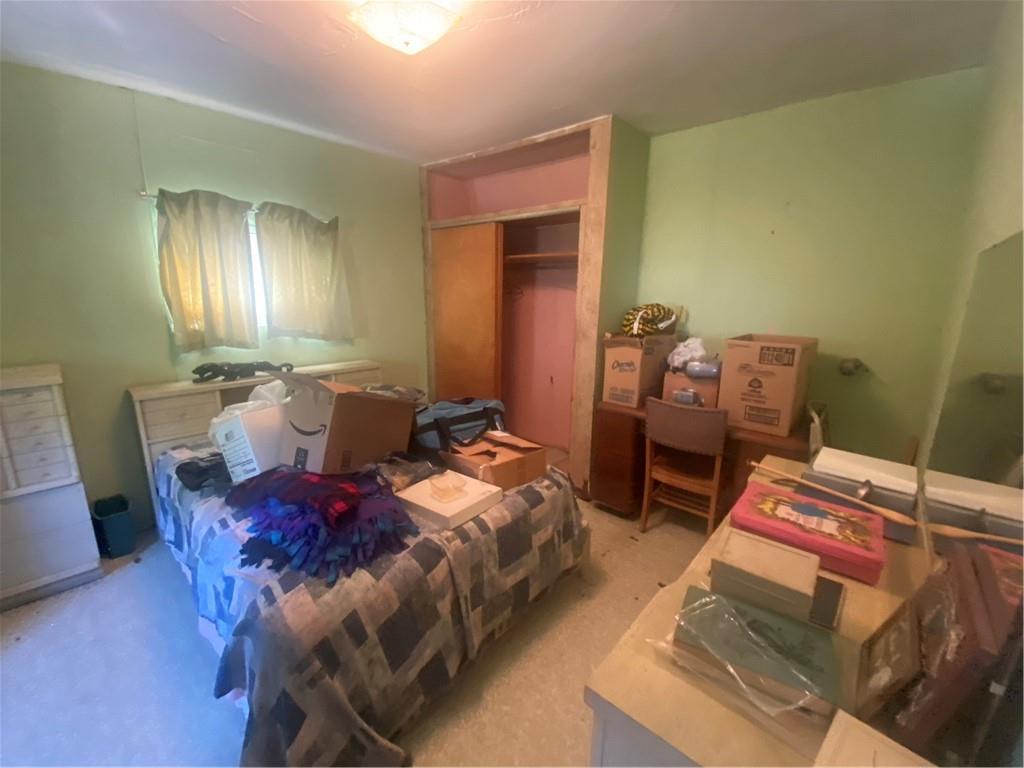 403 Bruce Street McKees Rocks, PA 15136 - Photo 14 of 20 a bed room with a bed and a tv