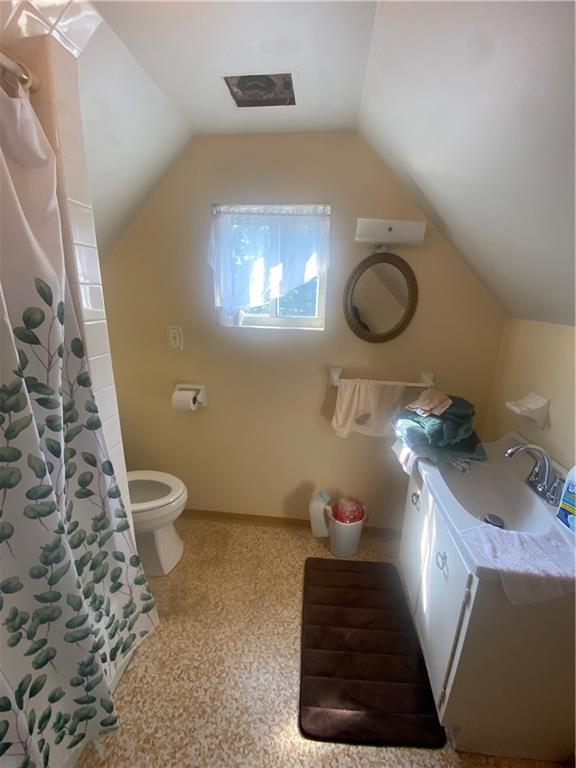 403 Bruce Street McKees Rocks, PA 15136 - Photo 15 of 20 a bathroom with a sink mirror vanity and toilet