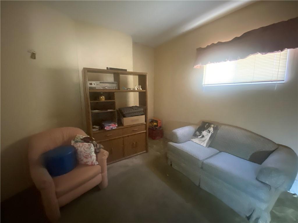 403 Bruce Street McKees Rocks, PA 15136 - Photo 2 of 20 a living room with furniture and a air conditioner vent