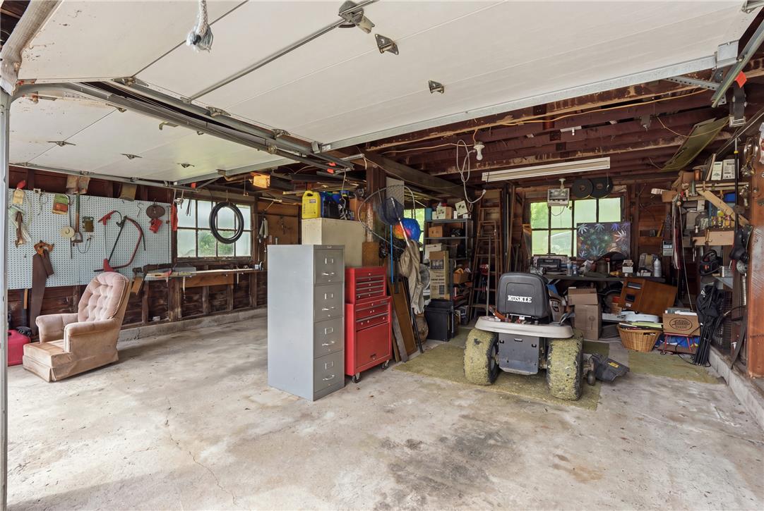 3573 Lower Saucon Road Hellertown, PA 18055 - Photo 22 of 56 An expansive garage space features concrete flooring and abundant room for storage or projects.
