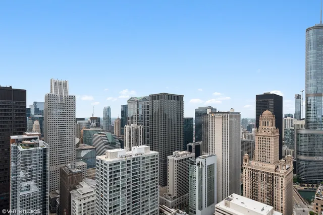 a view of city with tall buildings