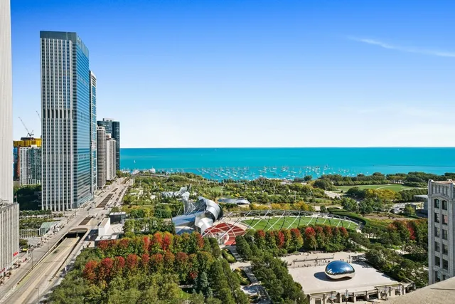 a view of city with ocean