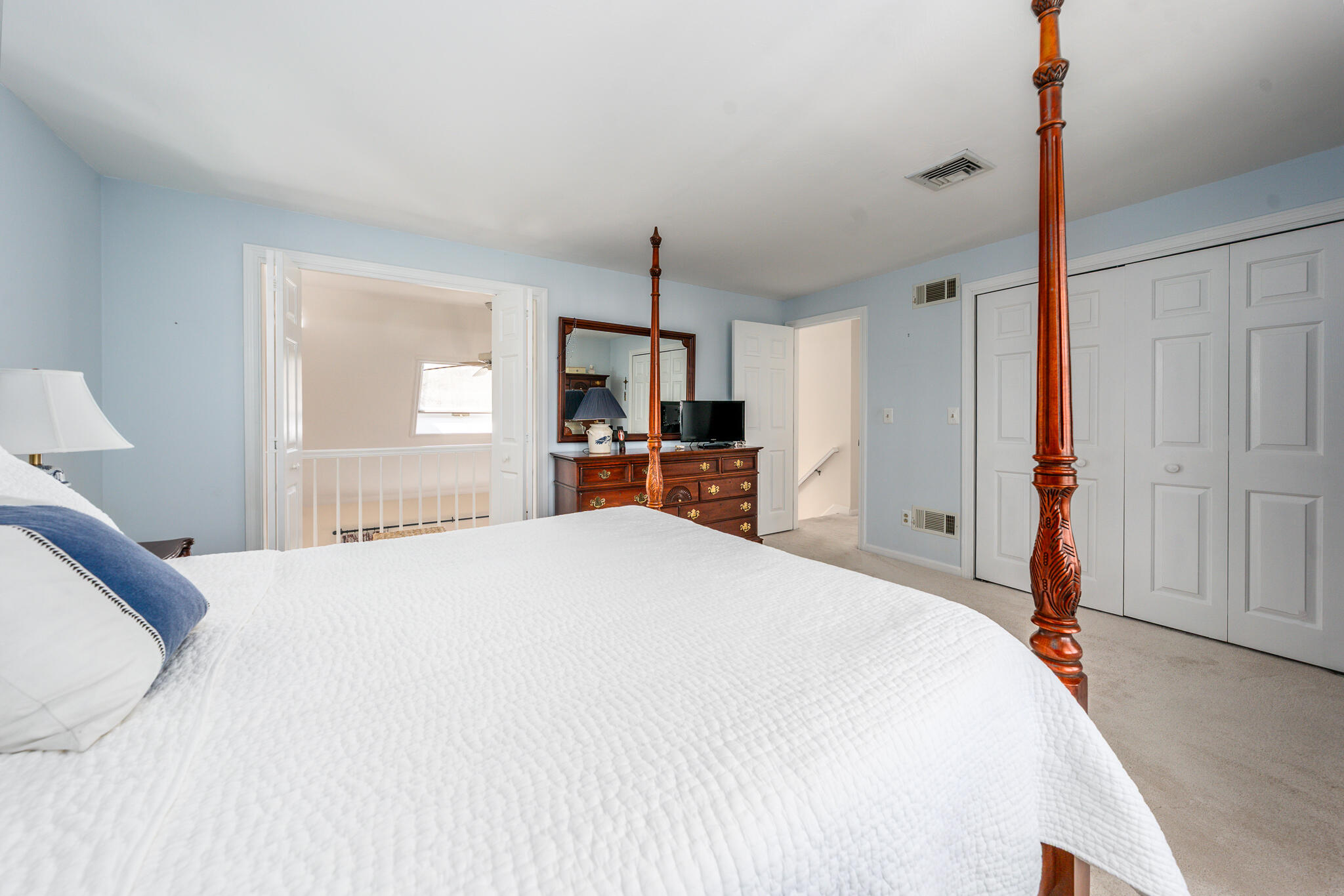 42 Eventide Lane Hyannis, MA 02601 - Photo 24 of 39 a bedroom with a large bed and dresser
