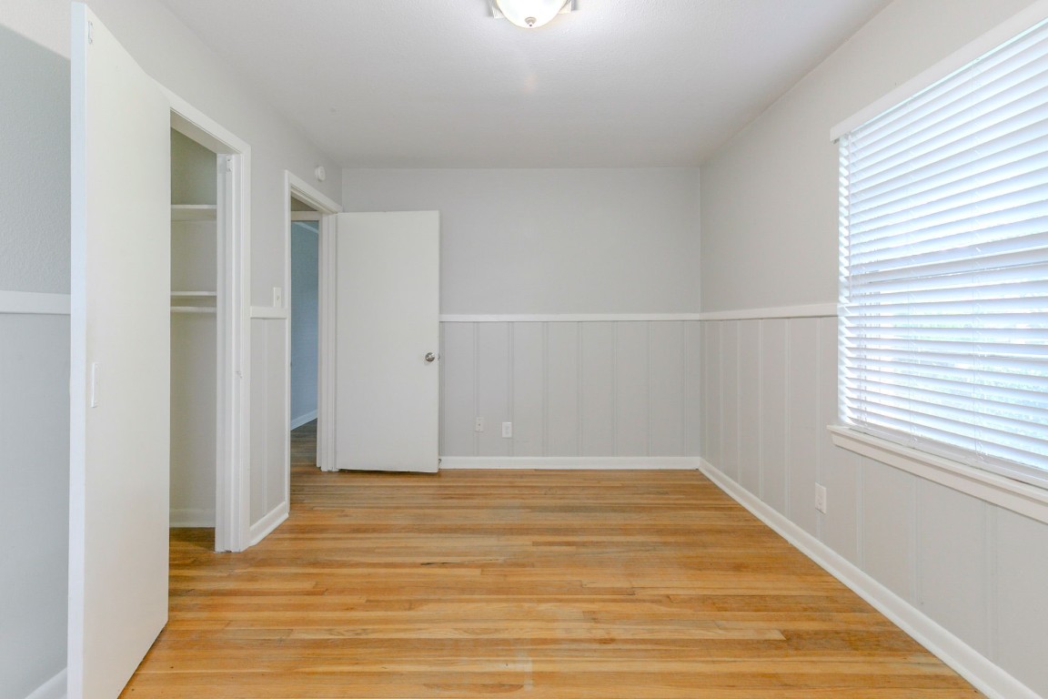 6609 Imogene Street Houston, TX 77074 - Photo 22 of 33 a view of a room with wooden floor and a window
