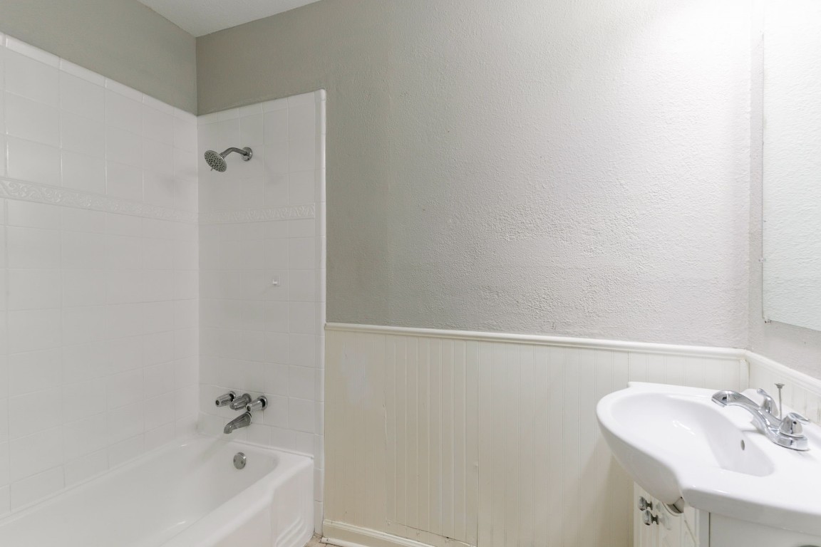 6609 Imogene Street Houston, TX 77074 - Photo 25 of 33 a bathroom with a sink and a bathtub