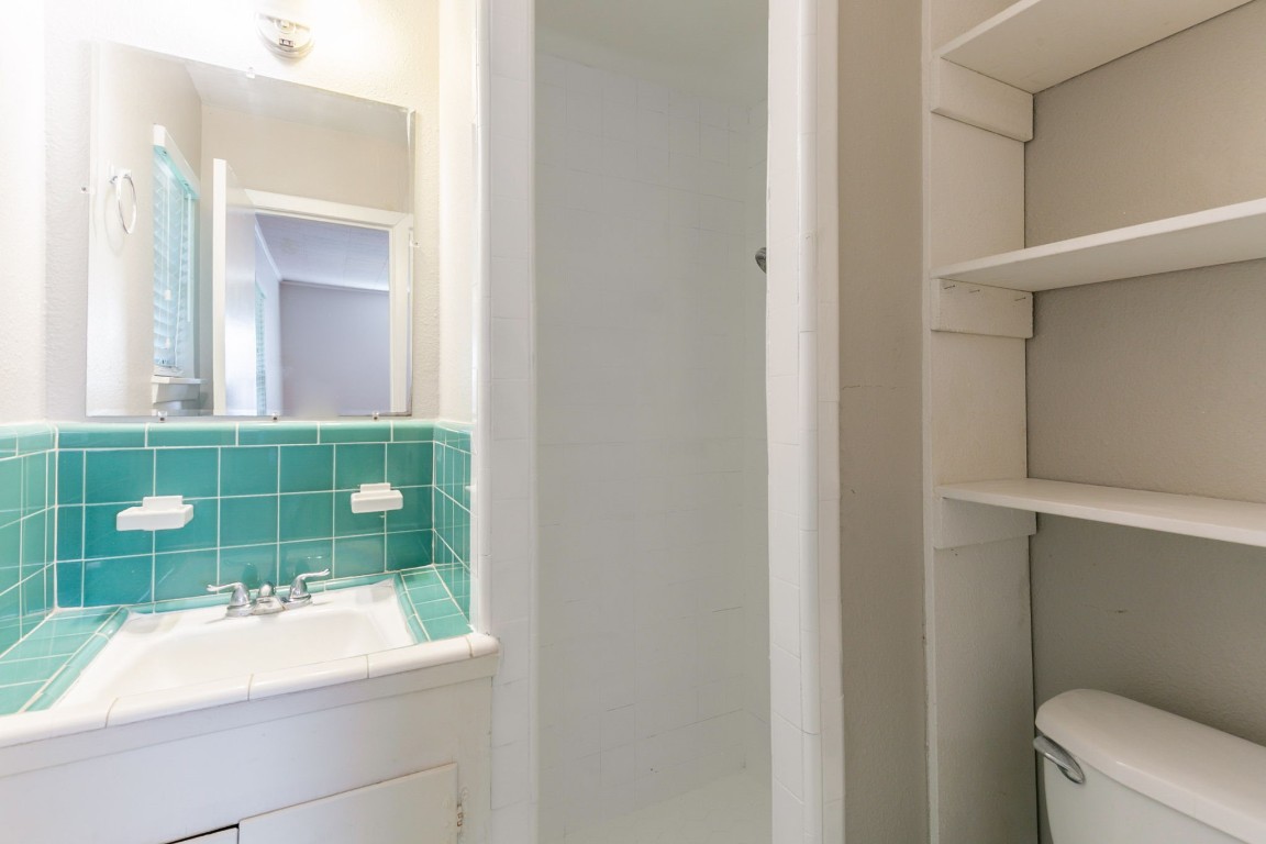 6609 Imogene Street Houston, TX 77074 - Photo 28 of 33 a bathroom with a sink and toilet