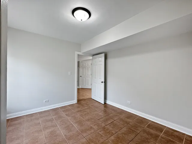 an empty room with an entryway