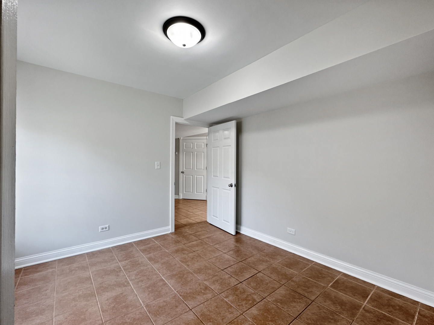 3135 Chicago Road, Unit 1FRONT Steger, IL 60475 - Photo 11 of 13 an empty room with an entryway