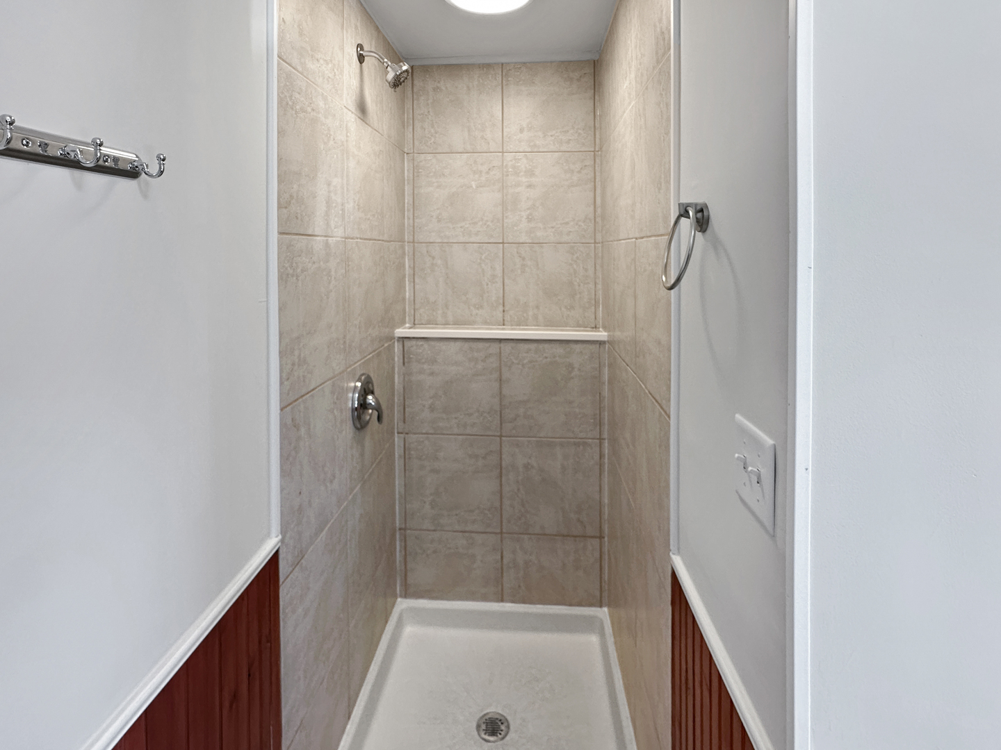 3135 Chicago Road, Unit 1FRONT Steger, IL 60475 - Photo 8 of 13 a bathroom with a shower