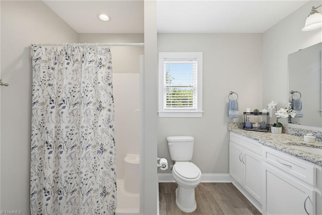 126 Applegate Court Mocksville, NC 27028 - Photo 18 of 37 Primary ensuite with walk-in shower and granite counters