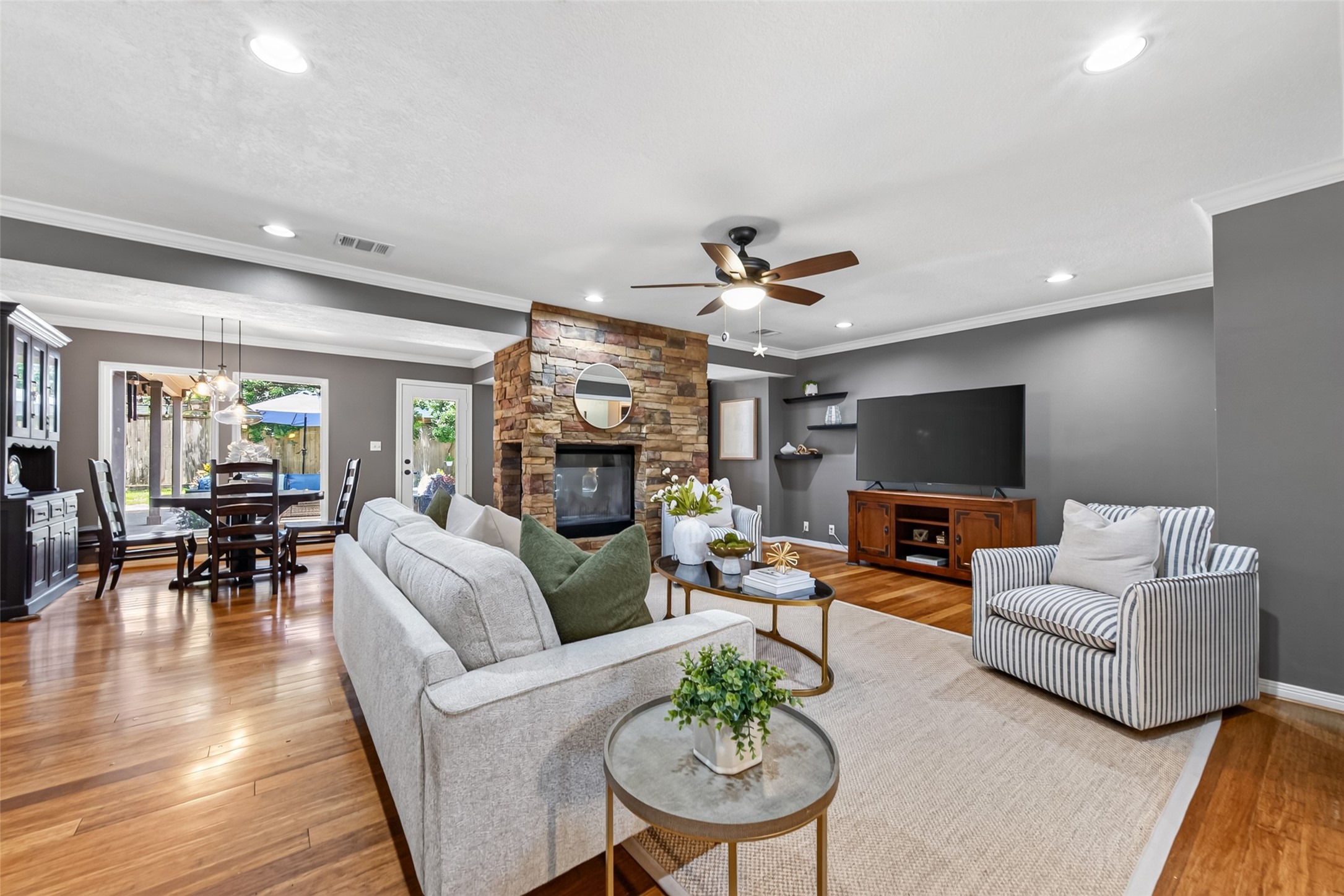 13506 Apple Tree Road Houston, TX 77079 - Photo 17 of 50 Family room has fireplace and is so open! So much natural light also!