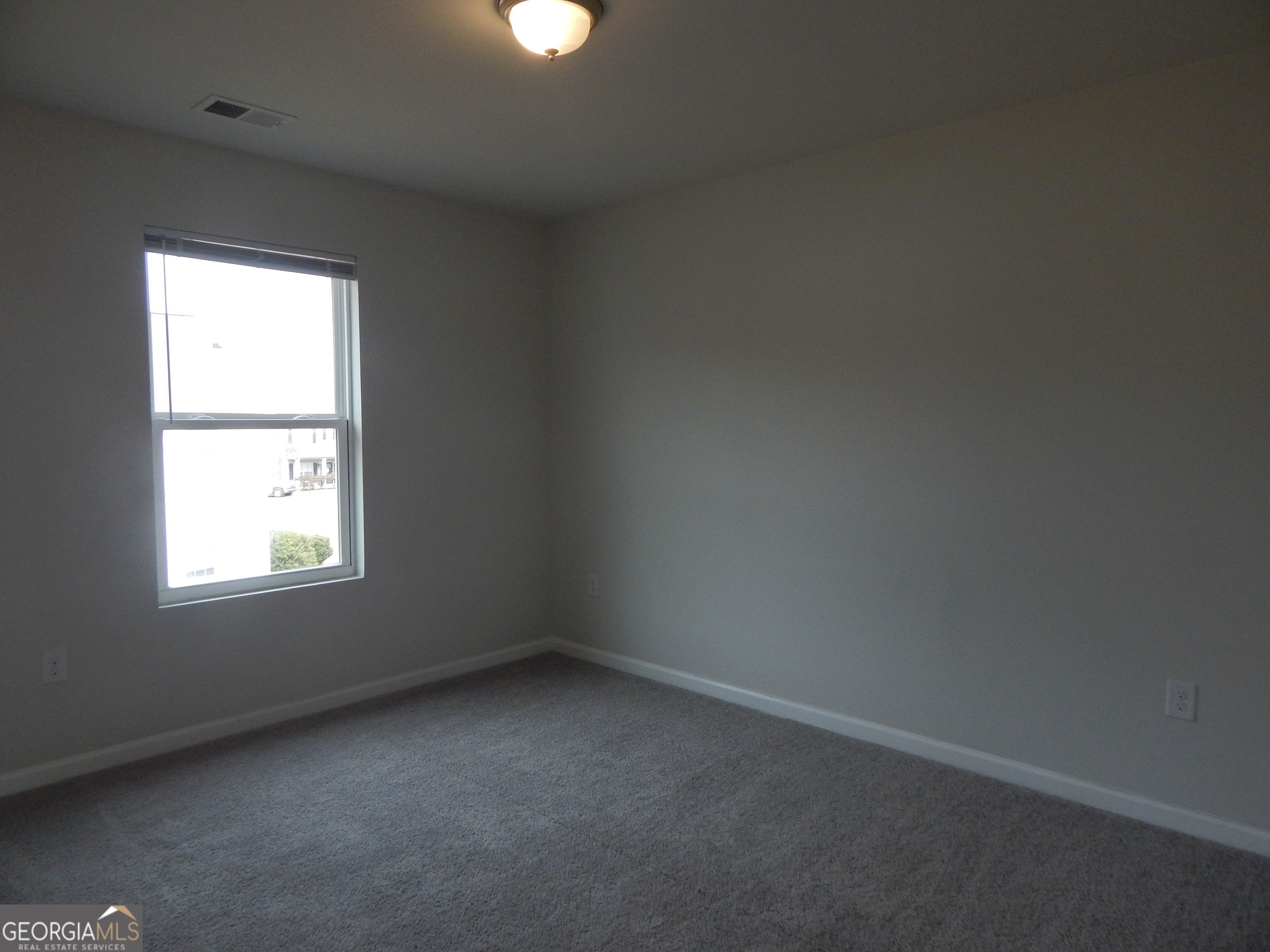 101 Sarah Lane LaGrange, GA 30241 - Photo 13 of 16 an empty room with a window