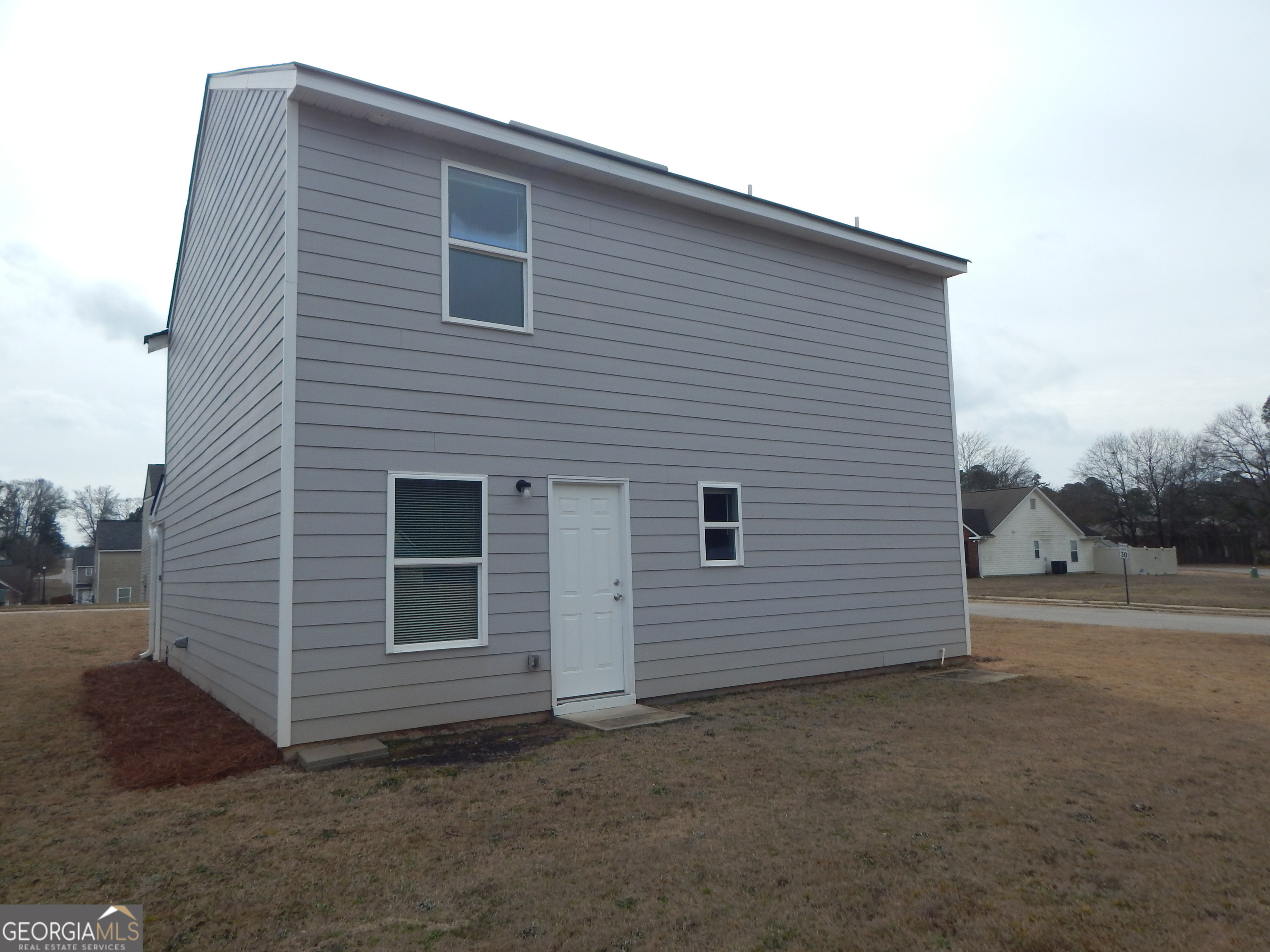 101 Sarah Lane LaGrange, GA 30241 - Photo 16 of 16 a view of a house with backyard