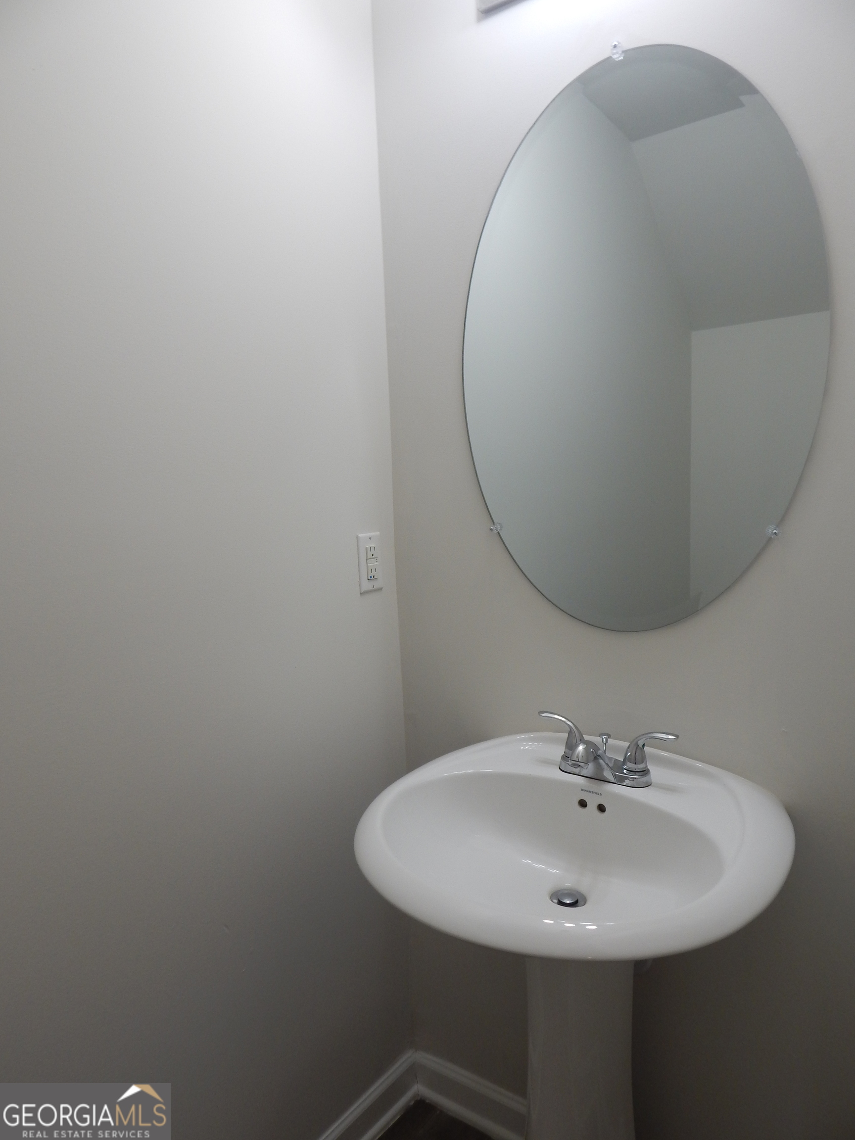 101 Sarah Lane LaGrange, GA 30241 - Photo 9 of 16 a bathroom with a sink and mirror