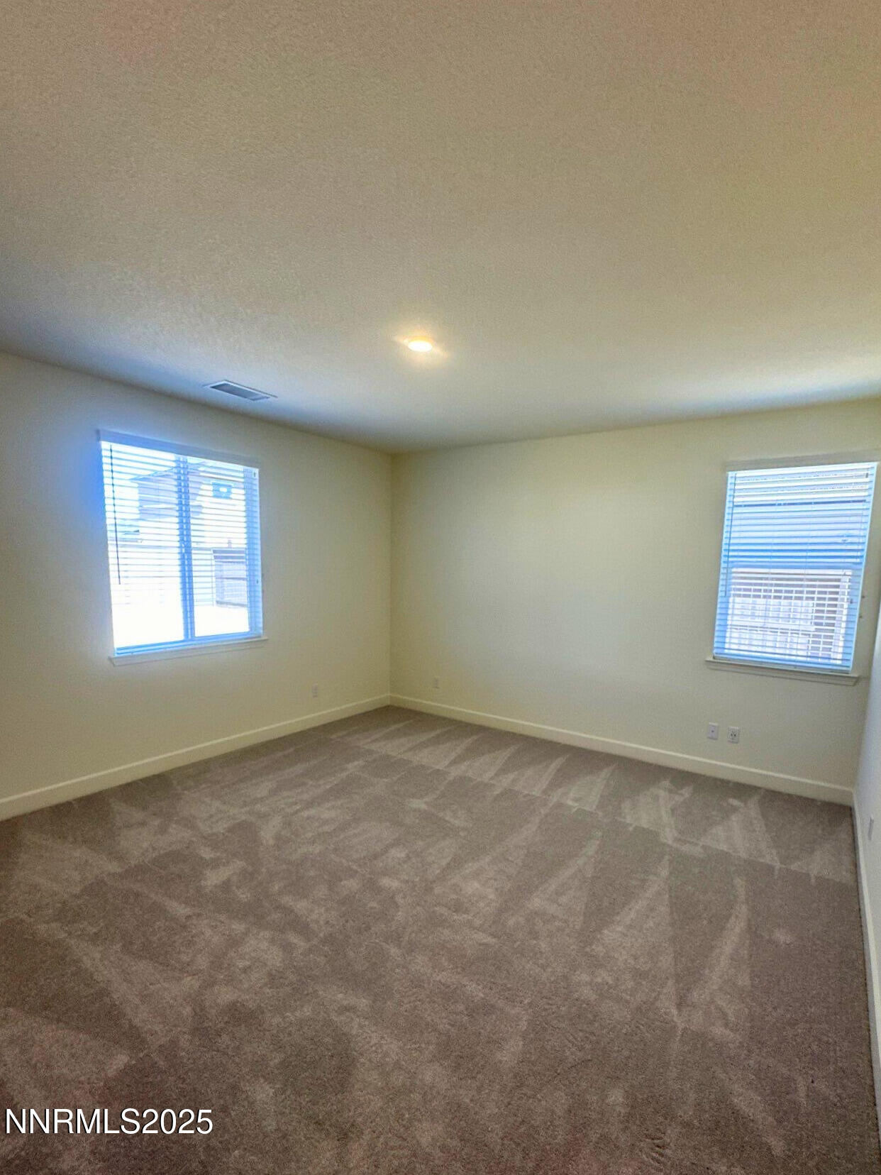 7145 Owl View Drive Sparks, NV 89436 - Photo 6 of 16 an empty room with a window