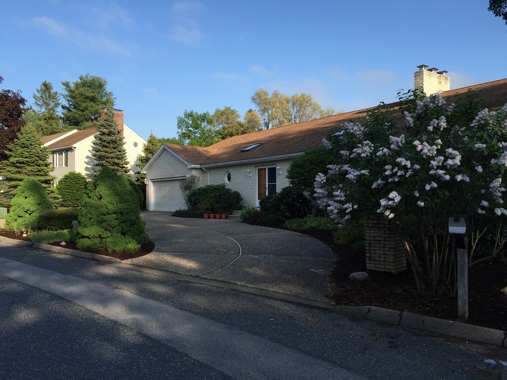 1 Winslow Road Needham, MA 02492 - Photo 2 of 27 a front view of a house with a yard