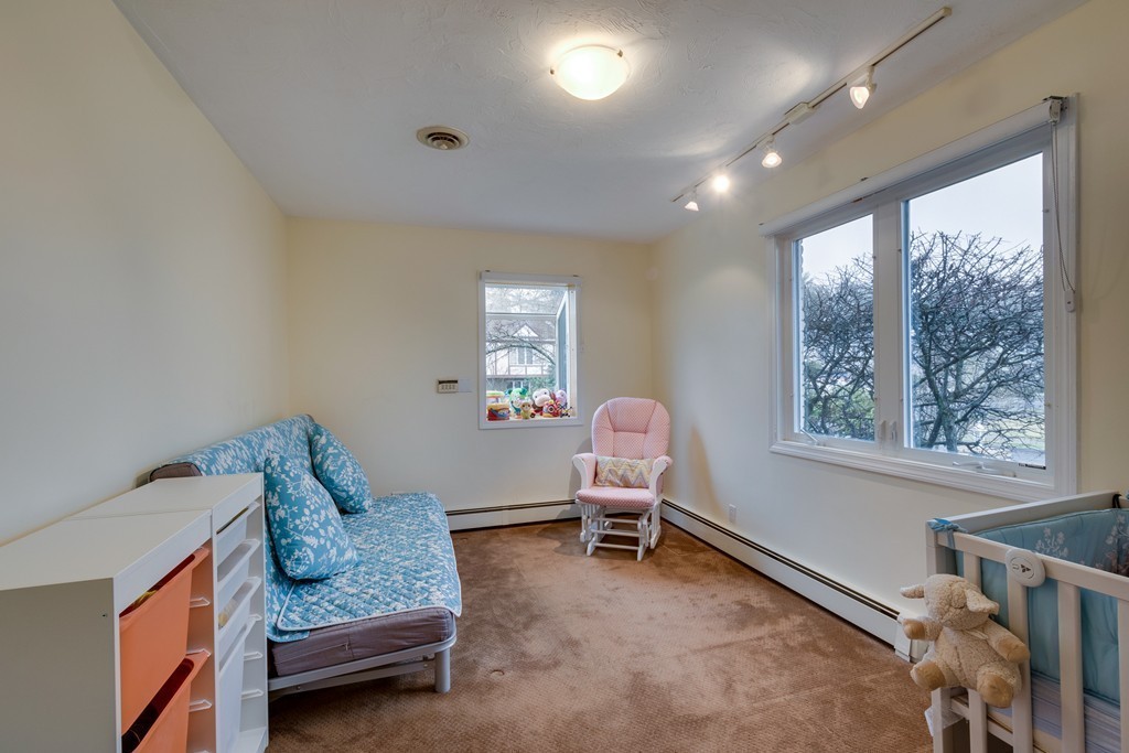 1 Winslow Road Needham, MA 02492 - Photo 21 of 27 a living room with furniture and a window