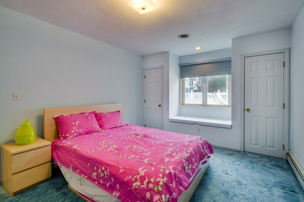 1 Winslow Road Needham, MA 02492 - Photo 24 of 27 a bedroom with a bed and a couch