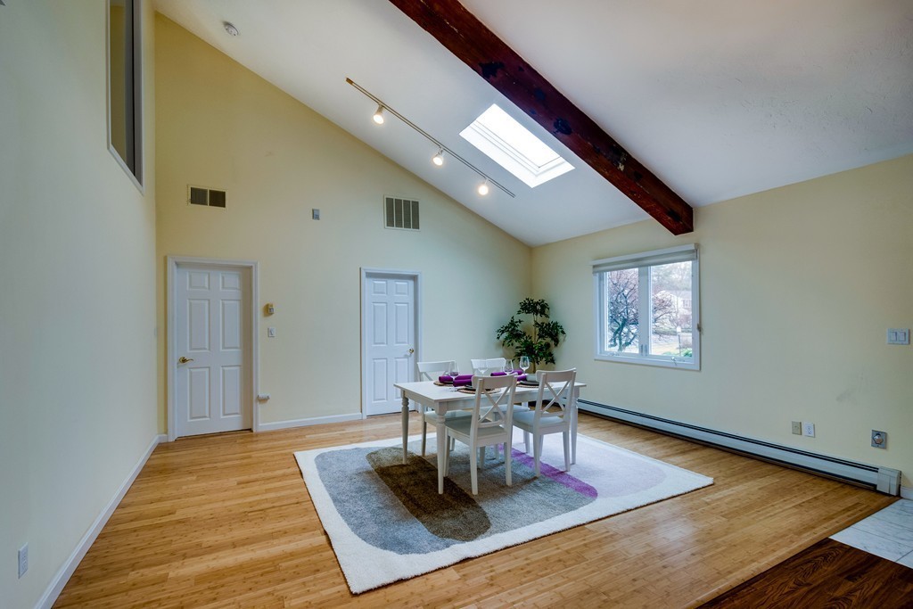 1 Winslow Road Needham, MA 02492 - Photo 10 of 27 a living room with furniture and a wooden floor