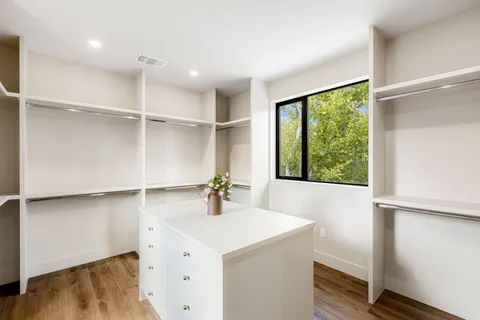 a bathroom with a sink and a large mirror