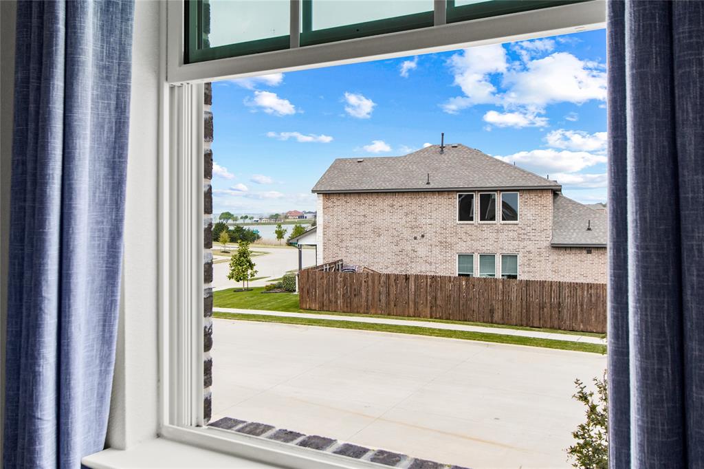 2070 Placerville Street Forney, TX 75126 - Photo 25 of 36 a view of a porch with a yard