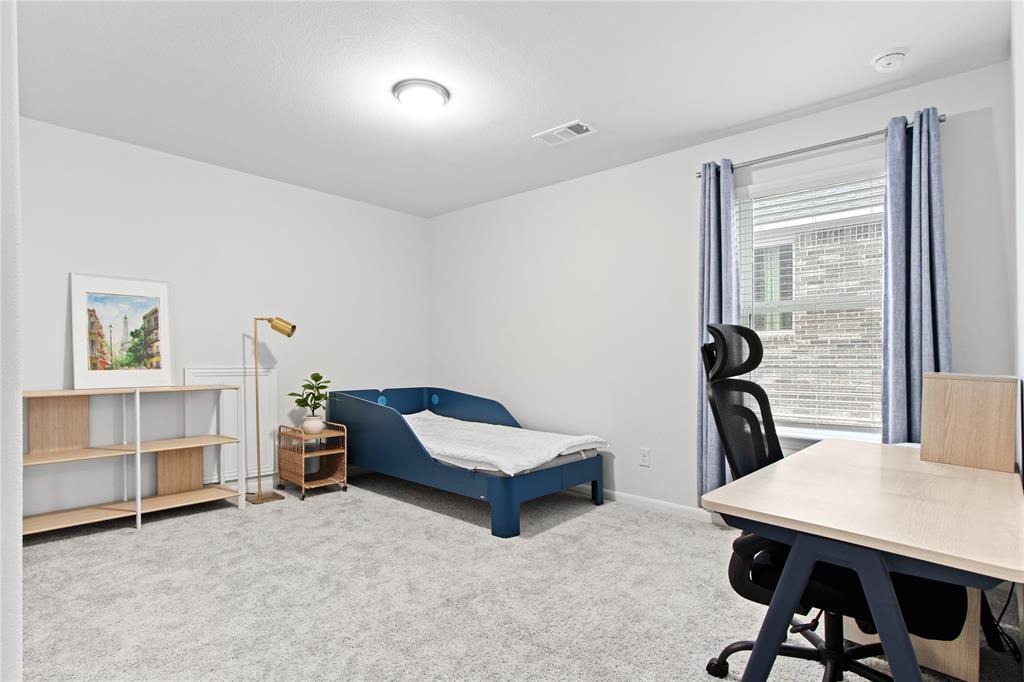 2070 Placerville Street Forney, TX 75126 - Photo 28 of 36 a living room with furniture and a table