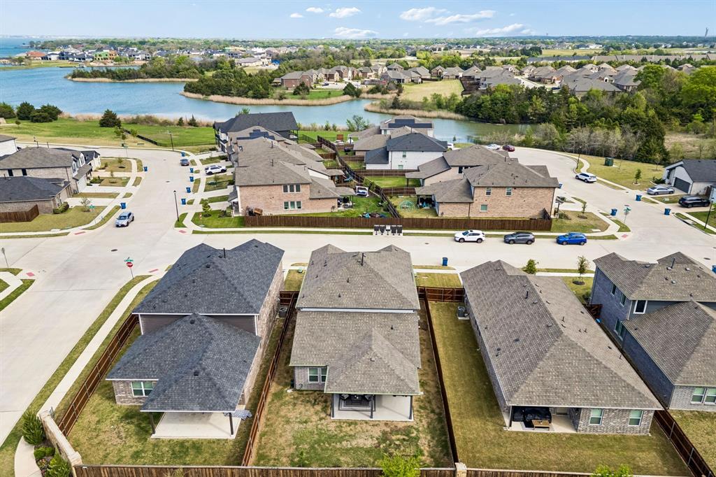 2070 Placerville Street Forney, TX 75126 - Photo 36 of 36 an aerial view of residential houses with outdoor space