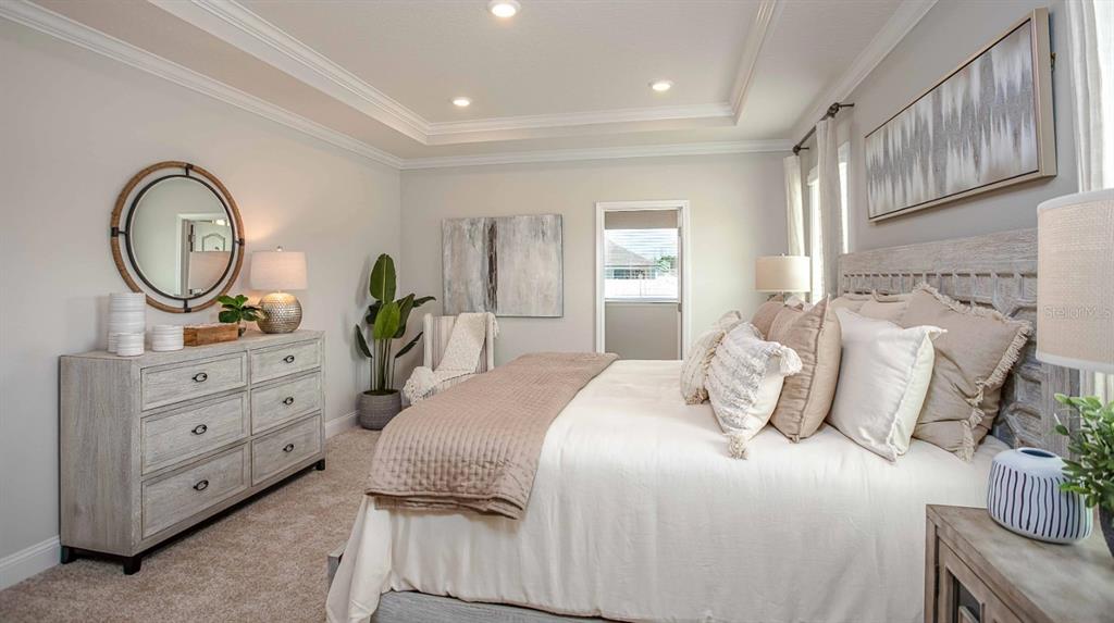 1103 Nackman Road North Port, FL 34288 - Photo 13 of 26 a bedroom with a bed and a dresser