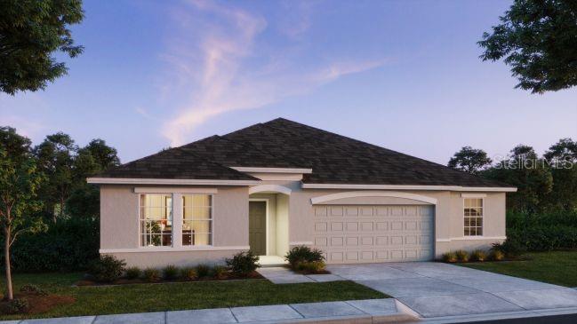 1103 Nackman Road North Port, FL 34288 - Photo 2 of 26 a front view of a house with a yard and garage