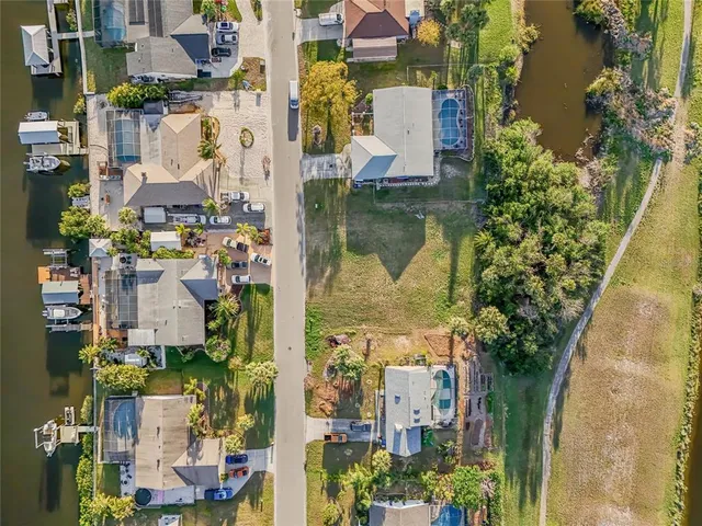 a aerial view of a house with a lake view