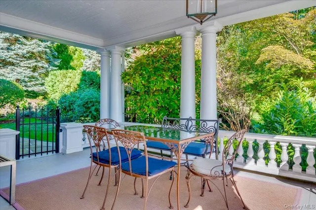 a view of an chairs and tables in the patio