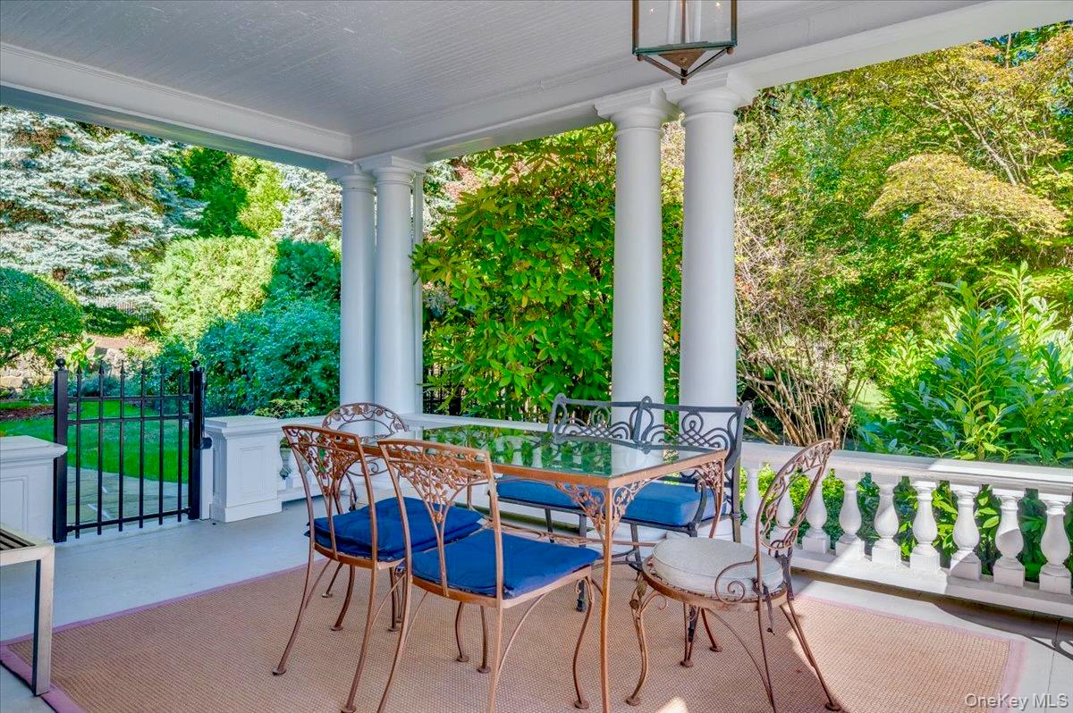 245 River Road Nyack, NY 10960 - Photo 3 of 45 a view of an chairs and tables in the patio